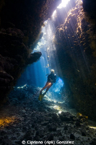diver at st Johns caves by Cipriano (ripli) Gonzalez 